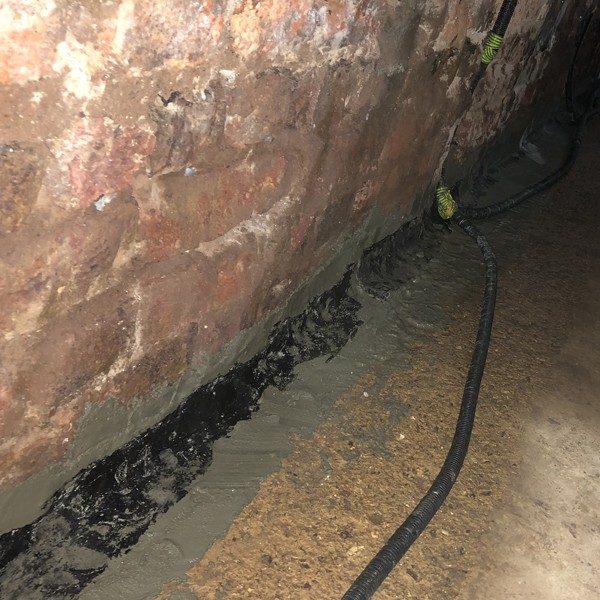 Flexible Joint Tape applied to seal damp cellar junctions